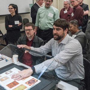 People using book scanning machines