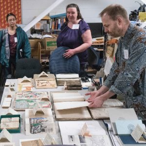 Librarian showing rare and special books