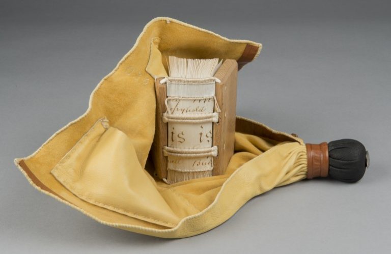 Model of a girdle book, small portable books worn by medieval European monks, clergymen and aristocratic nobles